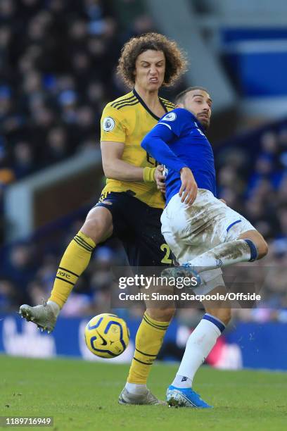 Cenk Tosun of Everton battles with David Luiz of Arsenal during the Premier League match between Everton FC and Arsenal FC at Goodison Park on...