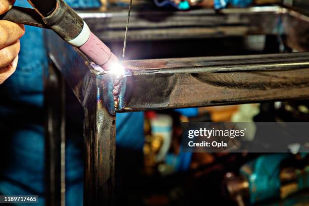 female tig welder - argon stock pictures, royalty-free photos & images