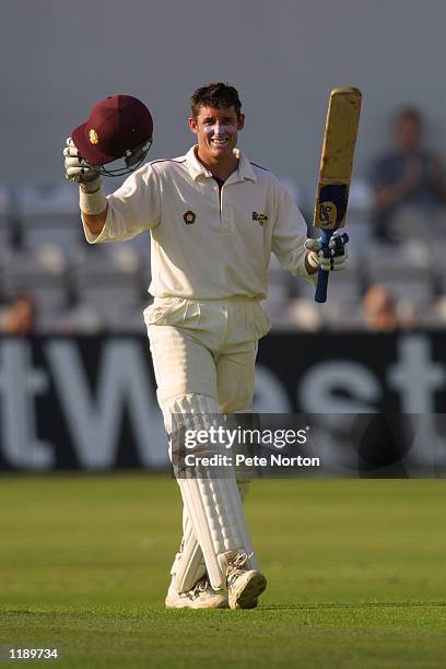 Michael Hussey of Northamptonshire celebrates reaching 200 on the 1st day of the Cricket-Cricinfo County Championship Division One match played...