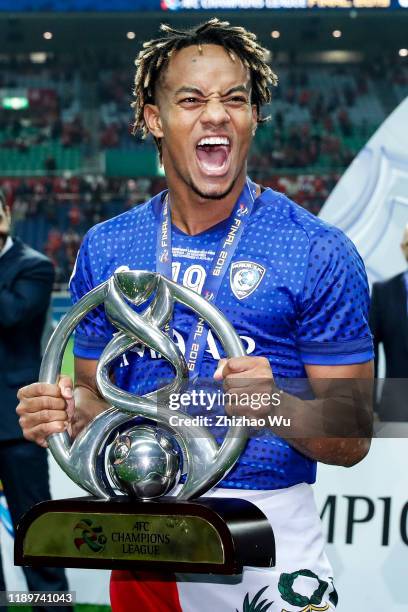 Andre Carrillo Diaz of Al Hilal celebrates the champion with the trophy after the AFC Champions League Final second leg match between Urawa Red...