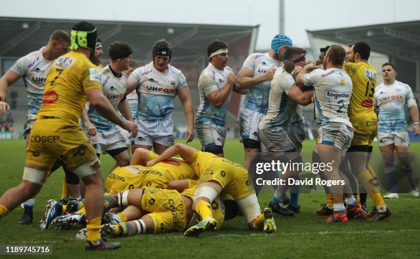 Fight breaks out which led to Pierre Bourgarit of La Rochelle is sent off by referee Andrew Brace during the Heineken Champions Cup Round 2 match...