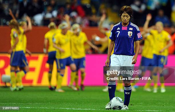 Kozue Ando of Japan looks dejected after Joseline Oeqvist of Sweden scored the first goal during the FIFA Women's World Cup Semi Final match between...