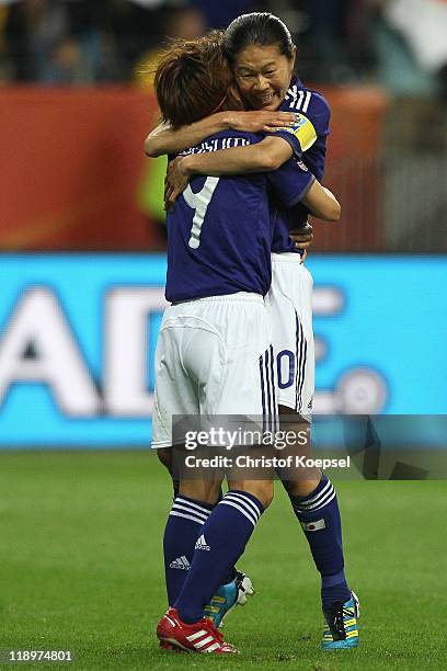 Nahomi Kawasumi of Japan celebrates the first goal with Homare Sawa of Japan during the FIFA Women's World Cup Semi Final match between Japan and...