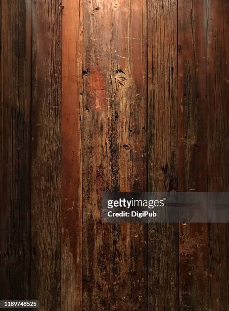 weathered wood wall illuminated in the night - old wall foto e immagini stock