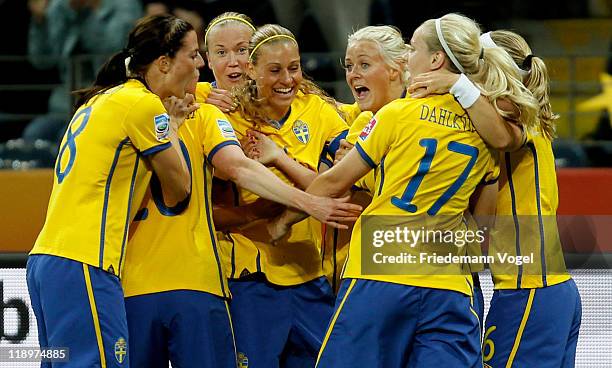 The team of Sweden celebrates Josefine Oeqvist scoring their team's first goal during the FIFA Women's World Cup Semi Final match between Japan and...