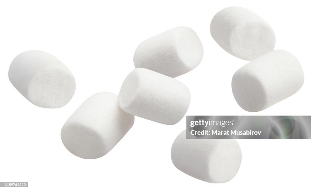 Flying marshmallows on white