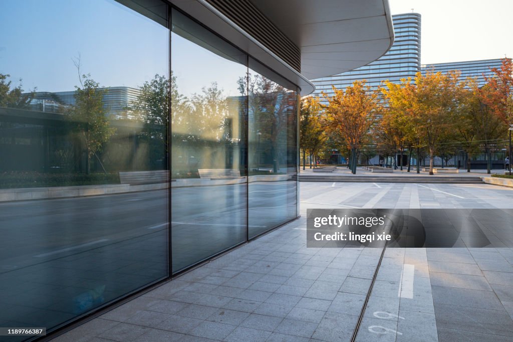 Glass facades and squares of buildings in a business district in Hangzhou, China