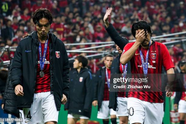 Sugimoto Kenyu and Koroki Shinzo of Urawa Red Diamonds show their dejection after the AFC Champions League Final second leg match between Urawa Red...
