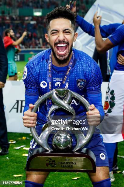 Hatan Sultan Bahbri of Al Hilal celebrates the champion with the trophy after the AFC Champions League Final second leg match between Urawa Red...