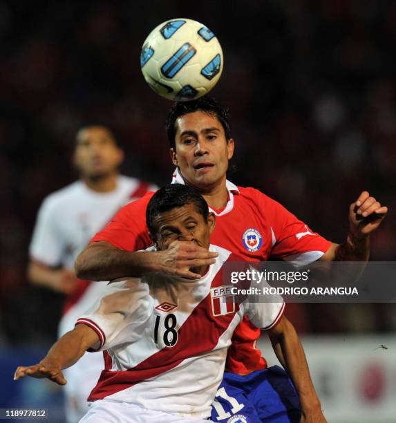 Chilean midfielder Luis Jimenez and Peruvian forward William Chiroque struggle for the ball, during a 2011 Copa America Group C first round football...