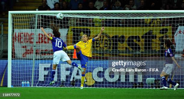 Homare Sawa of Japan heads her teams second goal during the FIFA Women's World Cup Semi Final match between Japan and Sweden at the FIFA World Cup...