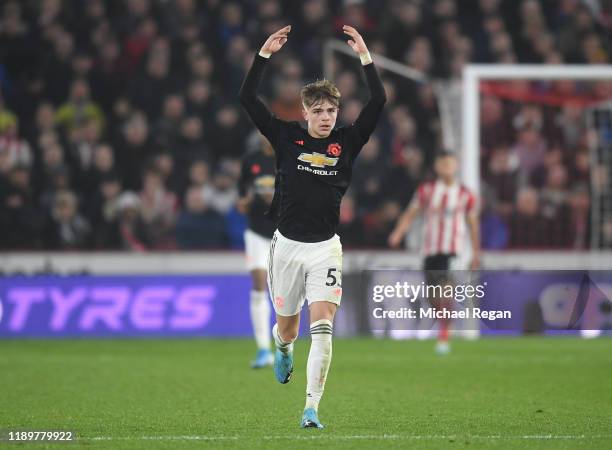 Brandon Williams of Manchester United celebrates after scoring his sides first goal during the Premier League match between Sheffield United and...