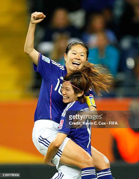 Homare Sawa of Japan celebrates her goal against Sweden with Nahomi Kawasumi during the FIFA Women's World Cup Semi Final match between Japan and...