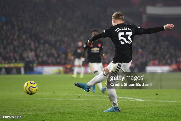 Brandon Williams of Manchester United scores his sides first goal during the Premier League match between Sheffield United and Manchester United at...