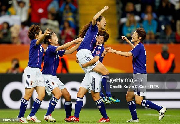 Homare Sawa of Japan celebrates her goal against Sweden with Nahomi Kawasumi, Yukari Kinga, Aya Miyama and Aya Sameshima during the FIFA Women's...