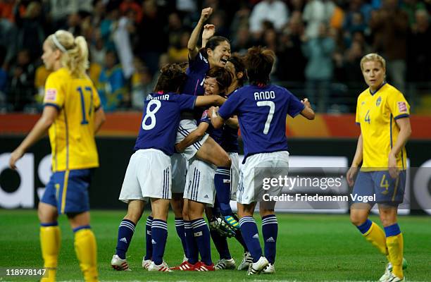 The team of Japan celebrate Homare Sawa scoring a goal during the FIFA Women's World Cup Semi Final match between Japan and Sweden at the FIFA World...