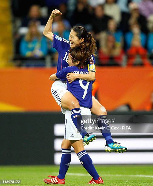 Homare Sawa of Japan celebrates her goal against Sweden with Nahomi Kawasumi during the FIFA Women's World Cup Semi Final match between Japan and...
