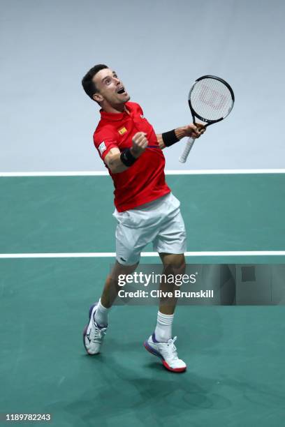 Roberto Bautista Agut of Spain celebrates match point in his singles final match against Felix Auger-Aliassime of Canada during Day Seven of the 2019...