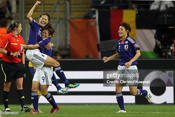 Homare Sawa of Japan celebrates the second goal with Nahomi Kawasumi of Japan during the FIFA Women's World Cup Semi Final match between Japan and...