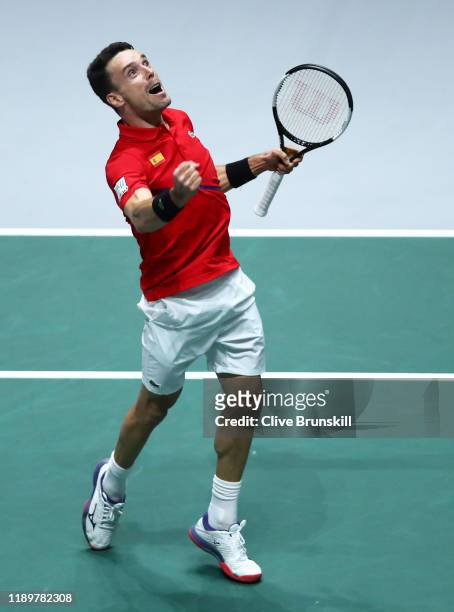 Roberto Bautista Agut of Spain celebrates match point in his singles final match against Felix Auger-Aliassime of Canada during Day Seven of the 2019...