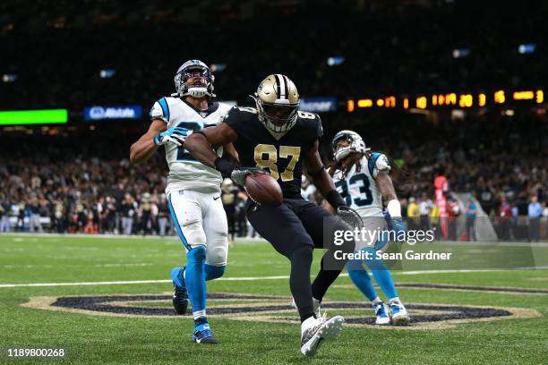 Jared Cook of the New Orleans Saints celebrates after scoring a 20 yard touchdown against the Carolina Panthers during the third quarter in the game...