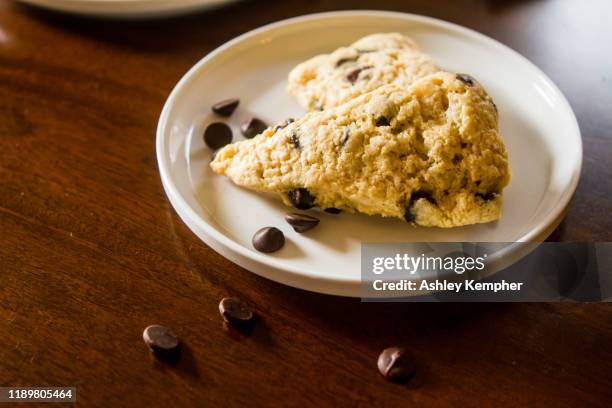 espresso scones on white plates - chocolate chip stock pictures, royalty-free photos & images