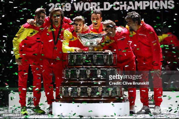 Marcel Granollers, Feliciano Lopez, Pablo Carreno Busta, Roberto Bautista Agut, Rafael Nadal and team captain Sergi Bruguera celebrate with the...