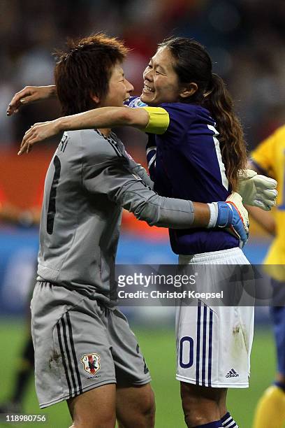 Ayumi Kaihori of Japan and Homare Sawa of Japan celebrate winning 3-1 the FIFA Women's World Cup Semi Final match between Japan and Sweden at the...