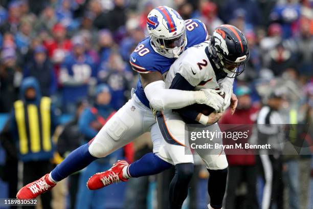 Shaq Lawson of the Buffalo Bills sacks Brandon Allen of the Denver Broncos during the third quarter of an NFL game at New Era Field on November 24,...