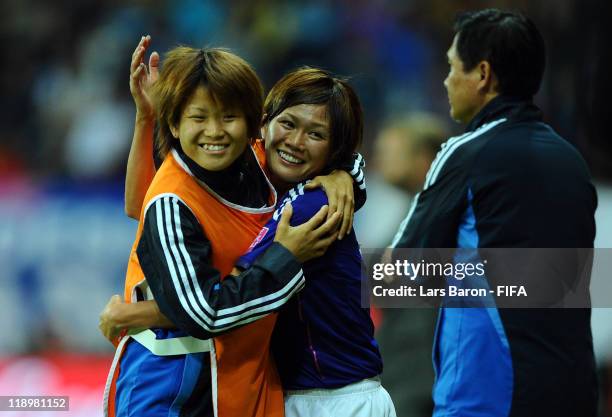 Nahomi Kawasumi of Japan celebrates with a team mate during the FIFA Women's World Cup Semi Final match between Japan and Sweden at the FIFA World...