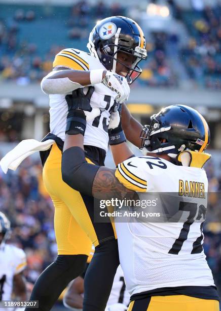 James Washington of the Pittsburgh Steelers celebrates with Zach Banner after running for a touchdown against the Cincinnati Bengals at Paul Brown...