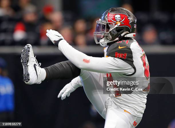 Lavonte David of the Tampa Bay Buccaneers reacts after a defensive stop against Brian Hill of the Atlanta Falcons at Mercedes-Benz Stadium on...