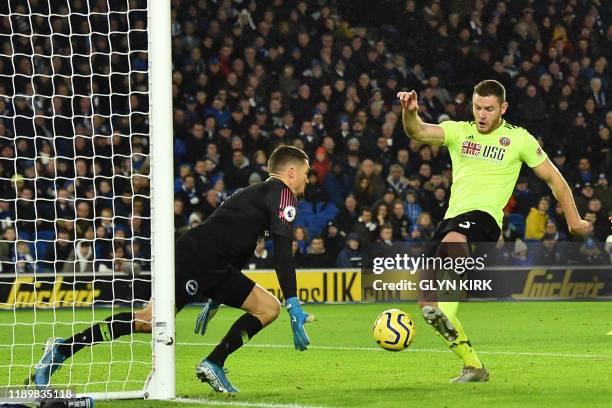 Sheffield United's English defender Jack O'Connell shoots to score but the goal was subsequently disallowed after a VAR review during the English...