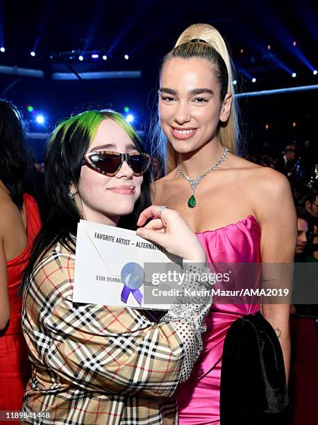 Billie Eilish and Dua Lipa attend the 2019 American Music Awards at Microsoft Theater on November 24, 2019 in Los Angeles, California.