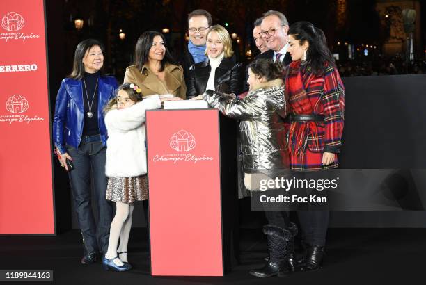 8th district Mayor Jeanne d’Hauteserre , Anne Hidalgo , actress Ludivine Sagnier black jacket and Champs Elysees Comitee President Jean-Noël...