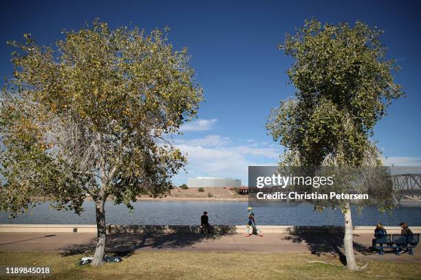 Participants competes in the run portion of 2019 Dignity Health Medical Group IRONMAN Arizona on November 24, 2019 in Tempe, Arizona.