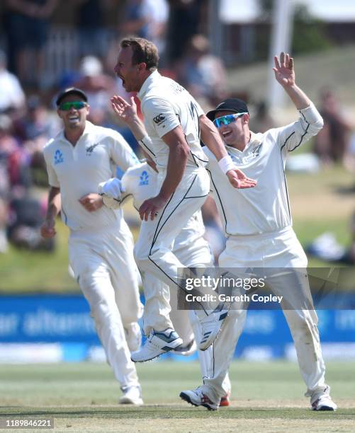 Neil Wagner of New Zealand celebrates dismissing Jos Buttler of England during day five of the first Test match between New Zealand and England at...