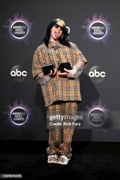 Billie Eilish, winner of New Artist of the Year and Favorite Artist - Alternative Rock, poses in the press room during the 2019 American Music Awards...