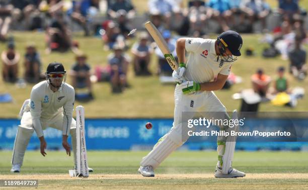 Jos Buttler of England is bowled during day five of the first Test match between New Zealand and England at Bay Oval on November 25, 2019 in Mount...