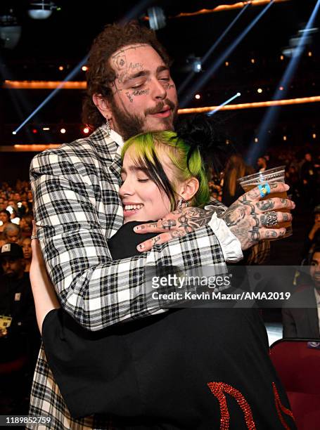 Post Malone and Billie Eilish attend the 2019 American Music Awards at Microsoft Theater on November 24, 2019 in Los Angeles, California.