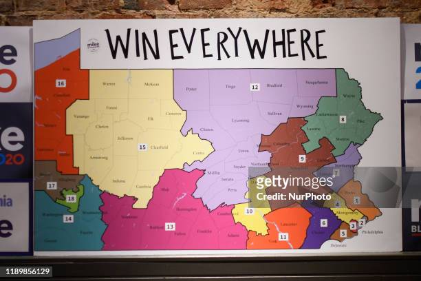 Map of Pennsylvania hangs on the wall as former NYC Mayor and democratic presidential candidate Michael Bloomberg opens a local campaign field office...