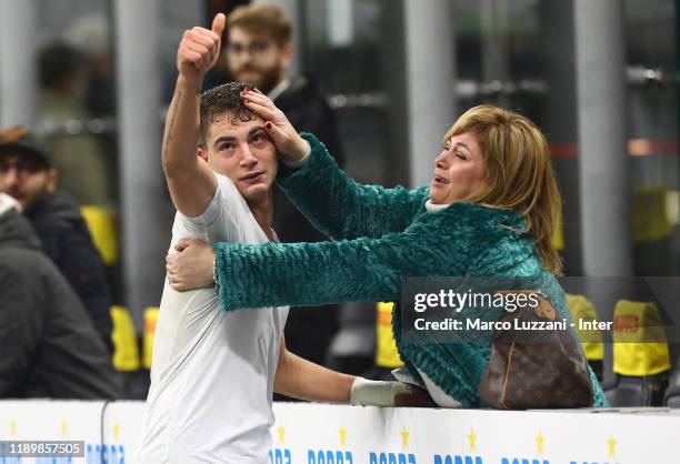 Sebastiano Esposito of FC Internazionale celebrates with his mother after winning the Serie A match between FC Internazionale and Genoa CFC at Stadio...