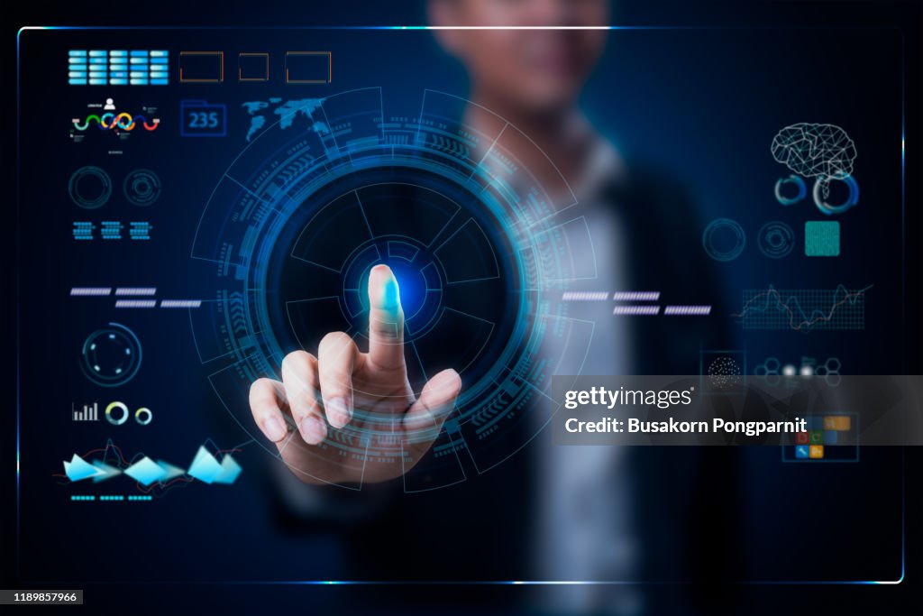 Businessman working on a virtual digital data technology concept design