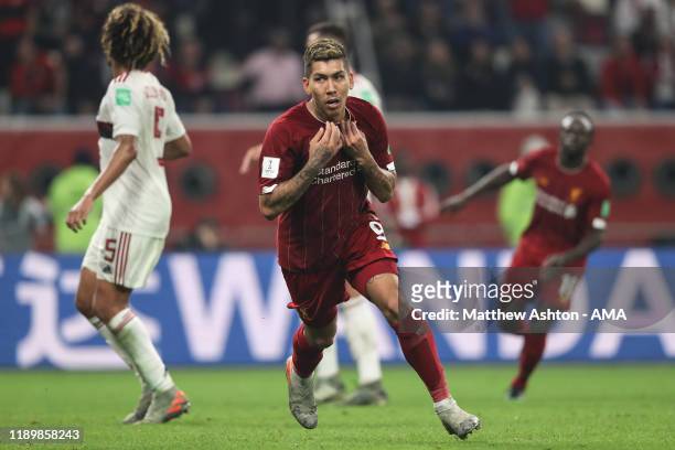 Roberto Firmino of Liverpool celebrates after scoring a goal to make it 1-0 during the FIFA Club World Cup Qatar 2019 Final match between Liverpool...