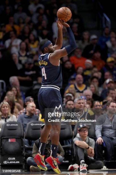 Paul Millsap of the Denver Nuggets puts up a shot against the Phoenix Suns in the fourth quarter at the Pepsi Center on November 24, 2019 in Denver,...