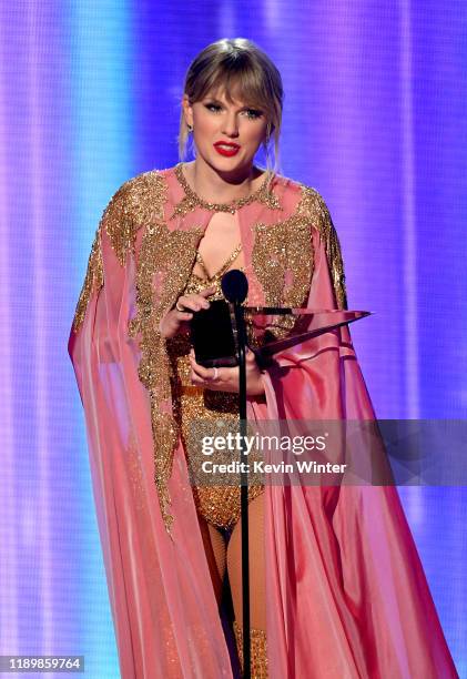 Taylor Swift accepts the Artist of the Year award onstage during the 2019 American Music Awards at Microsoft Theater on November 24, 2019 in Los...