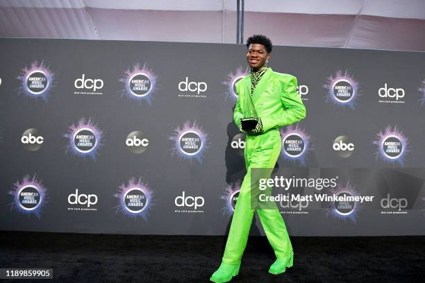 Lil Nas X, winner of the Favorite Song - Rap/Hip-Hop award for 'Old Town Road,' poses in the press room during the 2019 American Music Awards at...