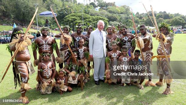 Prince Charles, Prince of Wales poses for a group photo with dancers following his public ocean event at Lawson Tama Stadium on November 25, 2019 in...