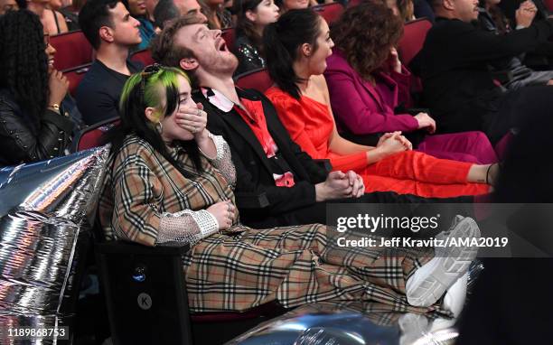 Billie Eilish and Finneas O'Connell attend the 2019 American Music Awards at Microsoft Theater on November 24, 2019 in Los Angeles, California.
