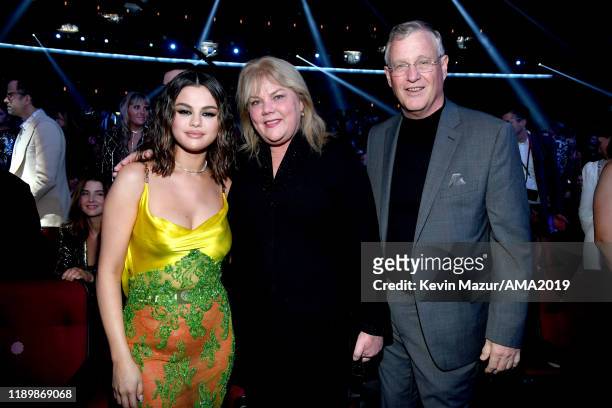 Selena Gomez, Scott Swift and Andrea Swift attend the 2019 American Music Awards at Microsoft Theater on November 24, 2019 in Los Angeles, California.